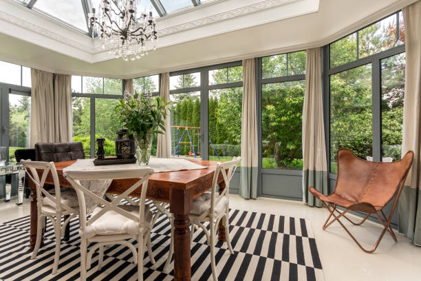 istock Luxurious dining room with a garden view 1207323591