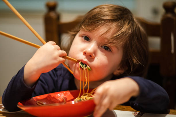 istock She is realy into noodle soup 1207326431