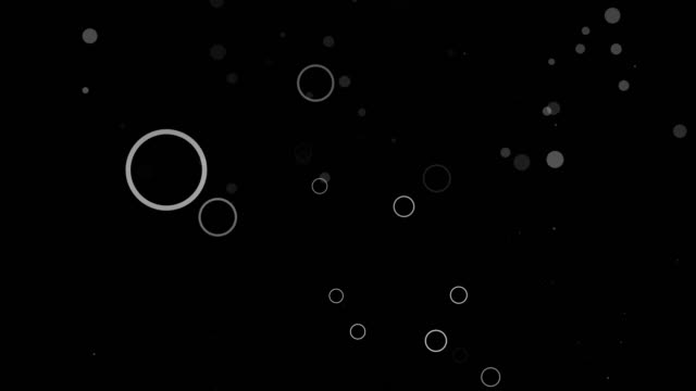 Animation of abstract bubbles on blue background floating in random motion.