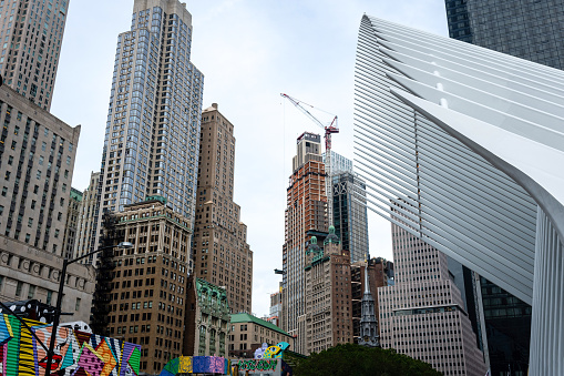 New York City, USA - June 7, 2019: skyscrapers near the pavillion of the Oculus, or World Trade Center Transportation Hub in Manhattan