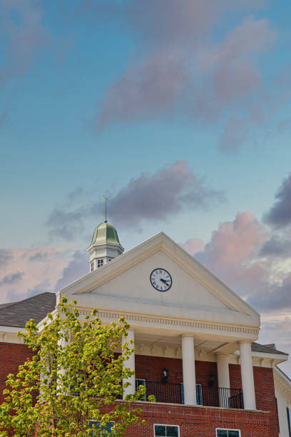 istock Clock on Face of Building at Dusk 1207330983