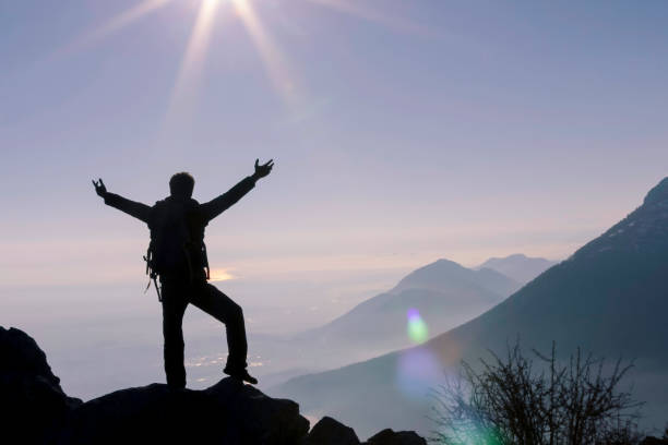 istock goal success, determination and summit happiness 1207331555
