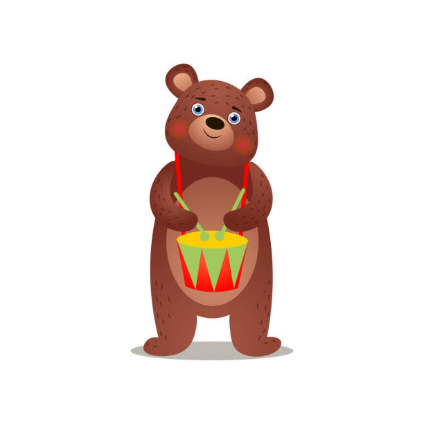 istock Cute brown bear with colorful drums and wood sticks 1207332732