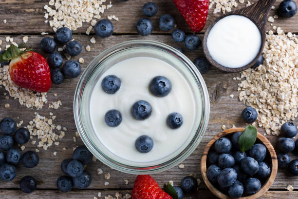 istock Strawberries, blueberries, oat flakes and yoghurt 1207339944