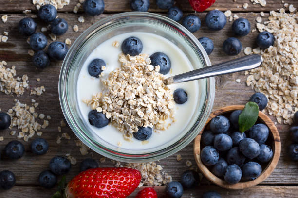 istock Strawberries, blueberries, oat flakes and yoghurt 1207339987