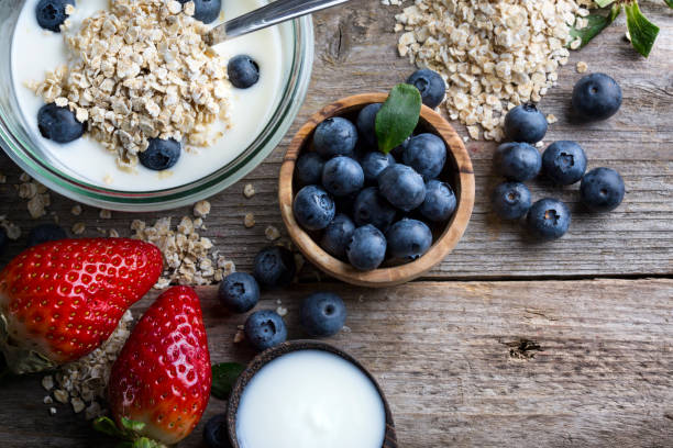 istock Strawberries, blueberries, oat flakes and yoghurt 1207340059
