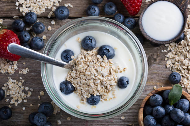 istock Strawberries, blueberries, oat flakes and yoghurt 1207340129