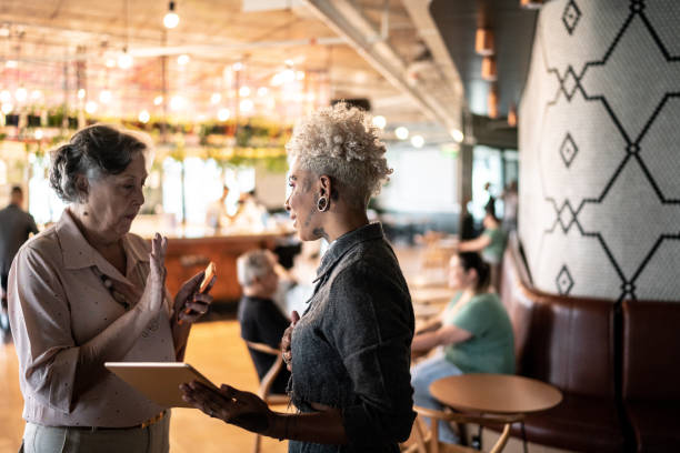 istock Business partners on a meeting using digital tablet at coworking 1207340462