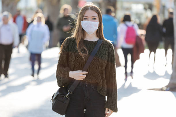 istock Woman wearing mask to avoid infectious diseases 1207341332