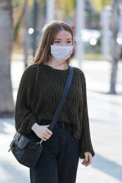 istock Woman wearing mask to avoid infectious diseases 1207341338