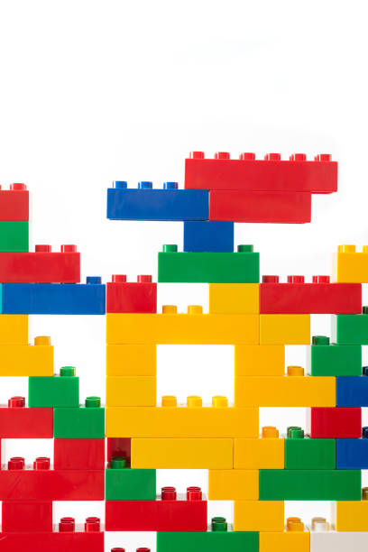 istock colorful toy bricks wall with gaps 1207343715