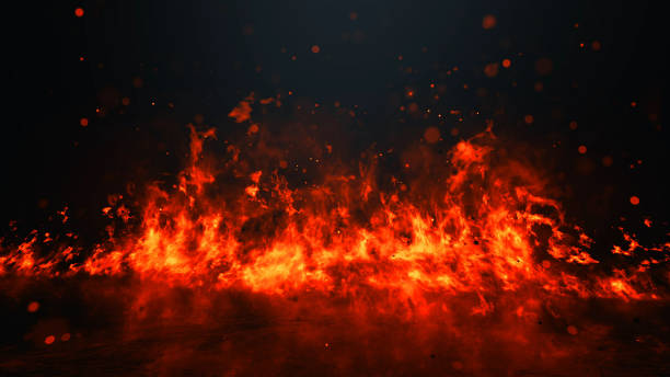 istock Red hot flames of fire isolated on black 1207345522