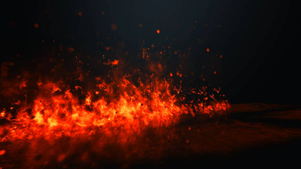 istock Red hot flames of fire isolated on black 1207346603