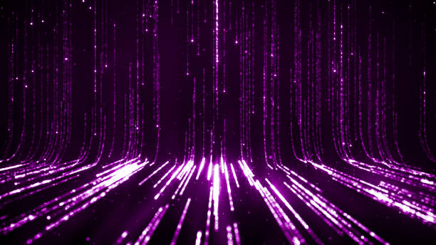 istock Twinkling golden glitter falling on flat surface lit by spotlight 1207346652