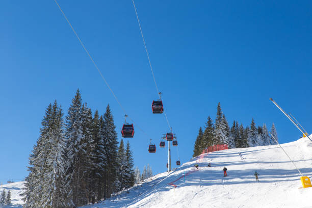 istock The place where three ski slopes cross. The weather is beautiful on the mountain and there is enough shade on the trails. 1207347380