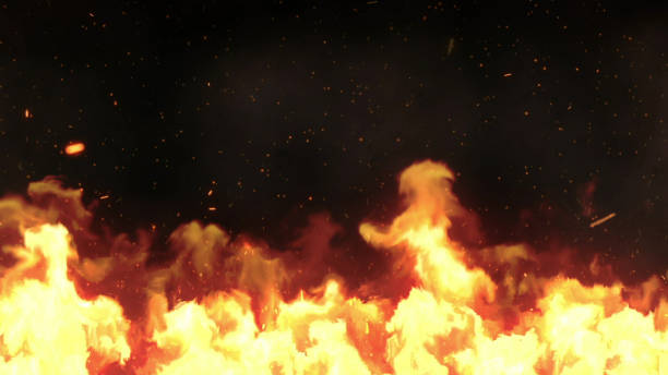 istock Red hot flames of fire isolated on black 1207348794
