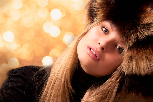 istock girl in a fur hat 120734899