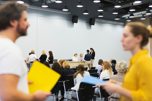 Group of business people attending an event in the board room