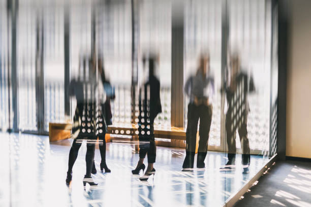 istock Unrecognizable business people in the lobby 1207352451