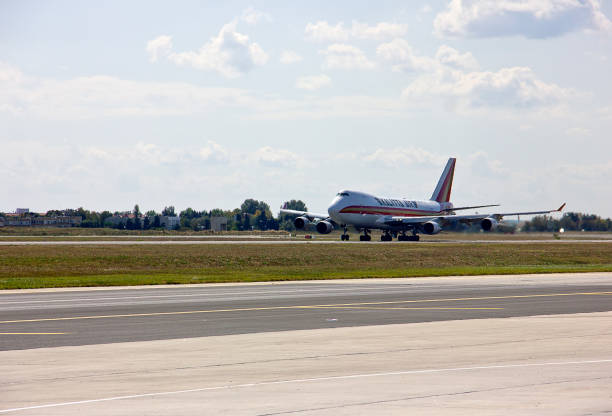 Istanbul, Turkey - September 21, 2019: Kalitta air planes are getting for their next flights in Istanbul Ataturk International Airport, Istanbul, Turkey. People get on to plane for travel.
