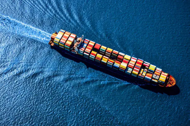 A fully loaded container ship heading toward the Port of Houston, Texas from the Gulf of Mexico.