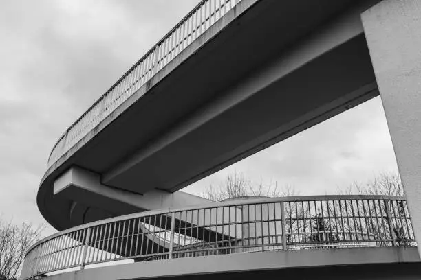 a pedestrian bridge as spiral as black and white in germany