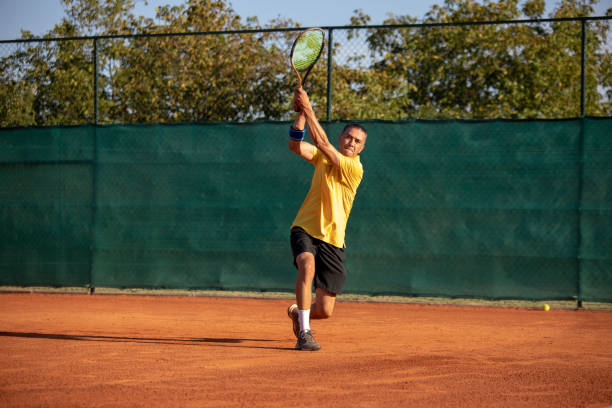 istock Tennis player on court 1207359056
