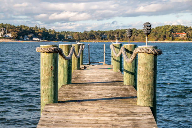 istock Faded wooden dock over the sea 1207359261