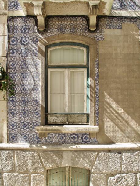 istock Old House Window with tiles in the facade 1207362436
