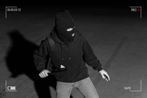 istock Robber Prepared For Crime In Dark Alley 1207364075
