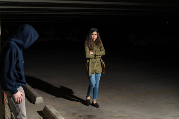 istock Robber Waiting For His Victim To Pass By At Night 1207365966