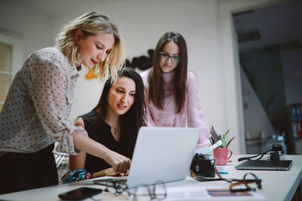 istock Young women working on a new design project 1207367884