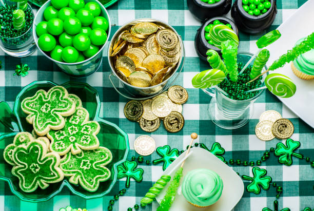 This is a bright and colorful green photograph of St Patrick's day party favors and food