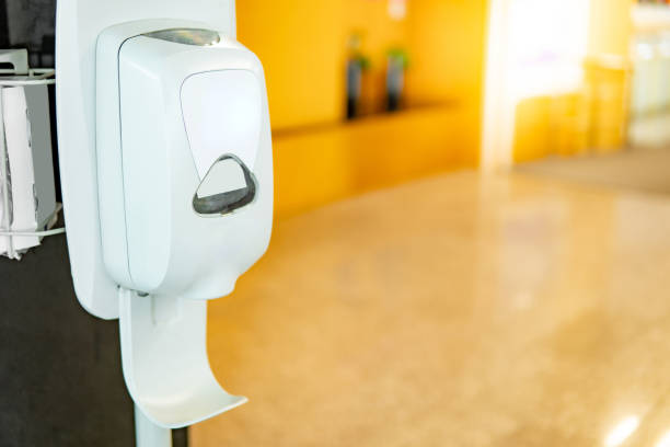 istock Automatic alcohol dispenser in hospital 1207368684