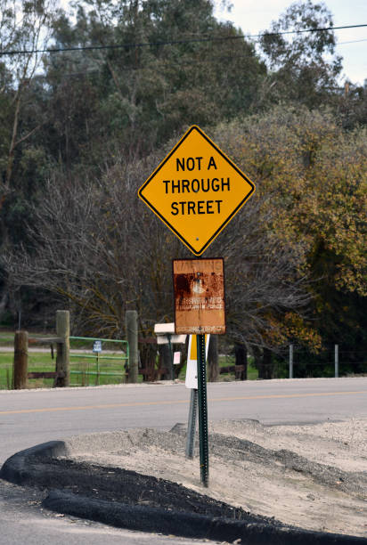 istock Not a through street sign in rural setting 1207372271