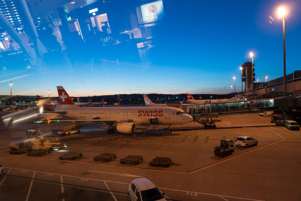 Zurich, Switzerland. January 15, 2020.  Sunset view of some planes at the airport of Zurich Kloten airport
