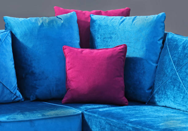istock Velvet pillows on textile couch 1207374966