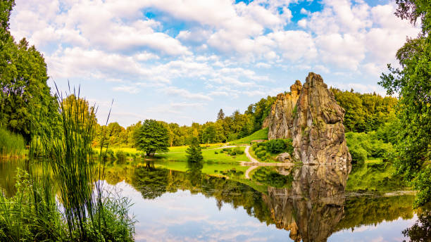 Externsteine in the Teutoburg Forest The Externsteine in the Teutoburg Forest on a beautiful summer day detmold stock pictures, royalty-free photos & images