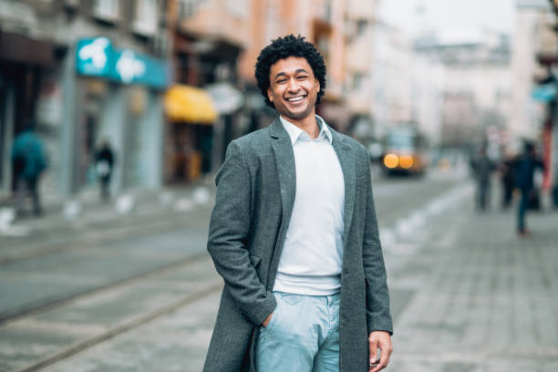 istock Modern man walking on the street 1207382447