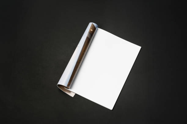 istock Mock-up magazine, newspaper or catalog isolated on black background. 1207387033