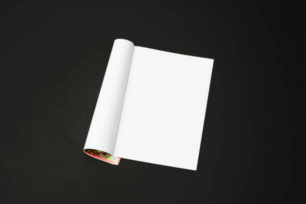 istock Mock-up magazine, newspaper or catalog isolated on black background. 1207387046