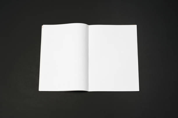 istock Mock-up magazine, newspaper or catalog isolated on black background. 1207387065