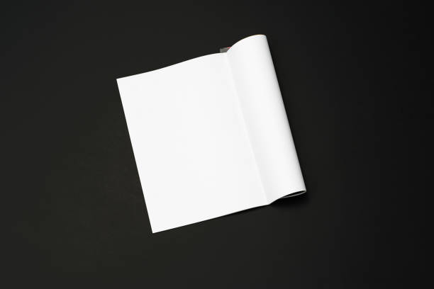 istock Mock-up magazine, newspaper or catalog isolated on black background. 1207387071