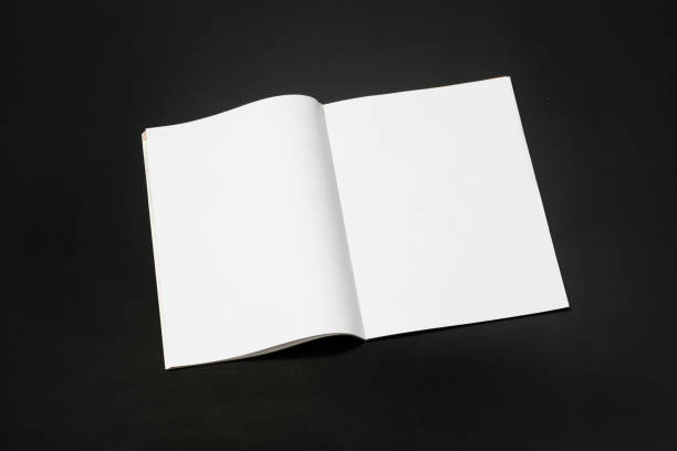 istock Mock-up magazine, newspaper or catalog isolated on black background. 1207387089