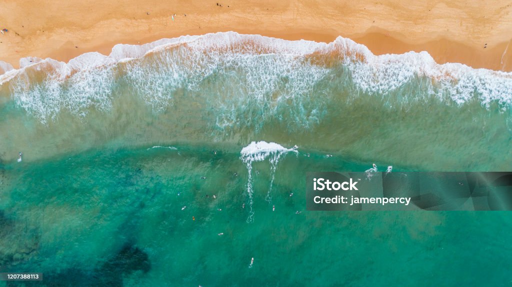 Surfers in big ocean waves, Sydney Australia by drone top down view Australia Stock Photo