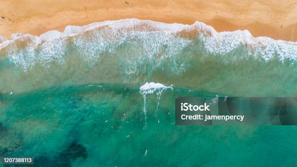 Surfers In Big Ocean Waves Sydney Australia By Drone Top Down View Stock Photo - Download Image Now
