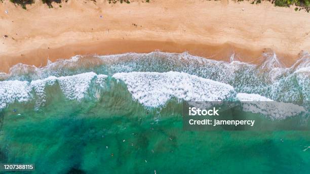 Surfers In Big Ocean Waves Sydney Australia By Drone Top Down View Stock Photo - Download Image Now