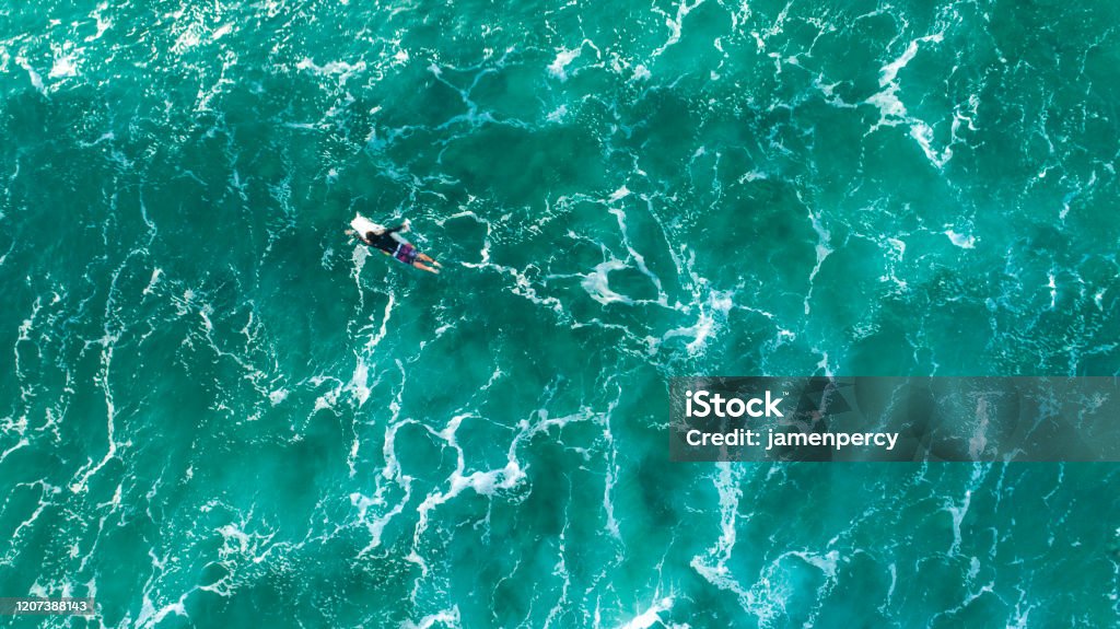 Surfers in big ocean waves, Sydney Australia by drone top down view Helicopter Stock Photo
