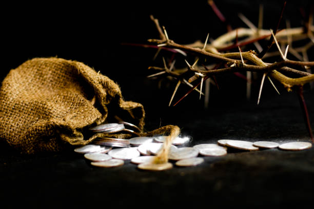 sack with the thirty silver coins biblical symbol of the betrayal of judas sack with the thirty silver coins biblical symbol of the betrayal of judas judas stock pictures, royalty-free photos & images