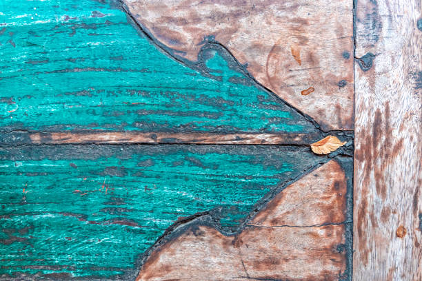 Wooden table with blue tree-like design pattern